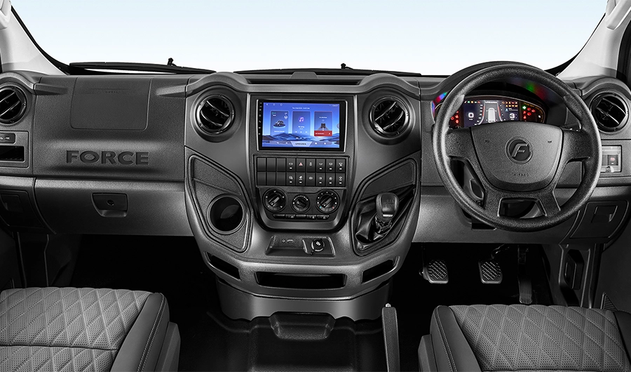 Driver cockpit dashboard of Force Motors Urbania with center touchscreen display and multi-function steering wheel