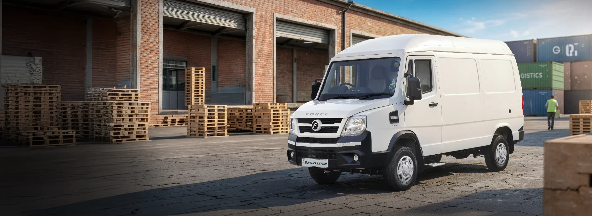 White Force Traveller cargo delivery van parked at a warehouse loading bay.