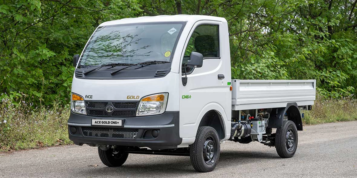 White Tata Ace Gold CNG+ mini truck parked on a paved road