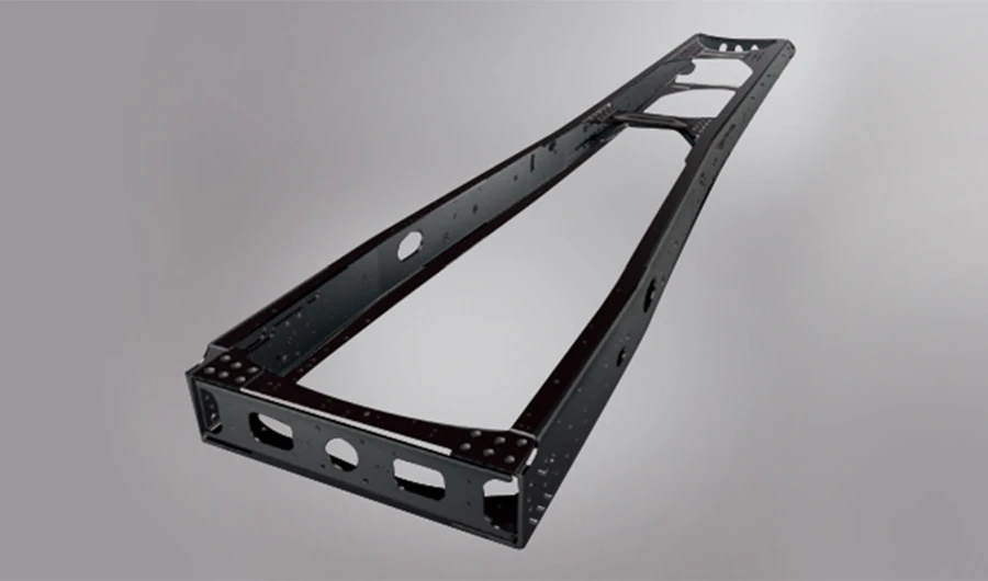 Perspective studio shot of a heavy-duty high-strength steel ladder-frame truck chassis on a grey gradient background.