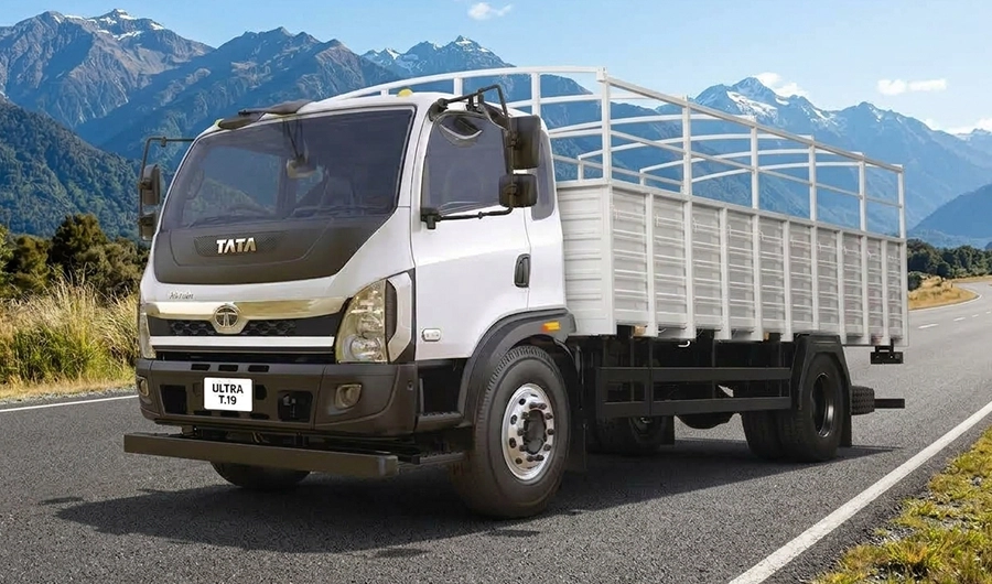 White Tata Ultra T.19 commercial cargo truck driving on a mountain highway