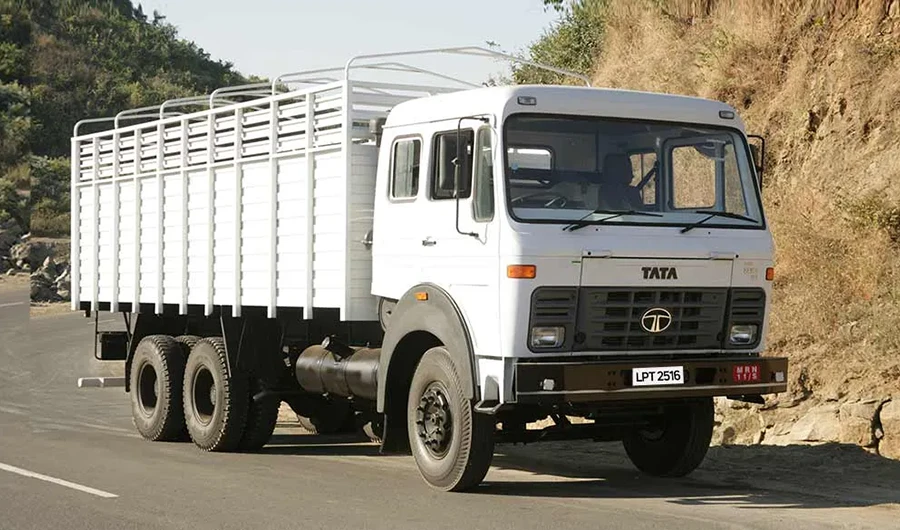 White Tata LPT 2516 high-sided commercial cargo truck parked on a roadside