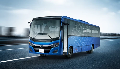 Blue Tata Starbus Ultra LPO 7.5/44 passenger bus driving on an open road