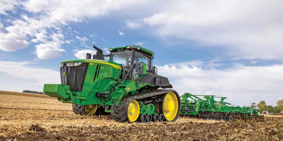 John Deere 9RT Series high-horsepower tracked agricultural tractor working in field
