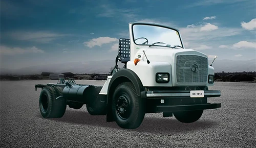 White Tata SE 1613 open cowl truck chassis parked on asphalt background