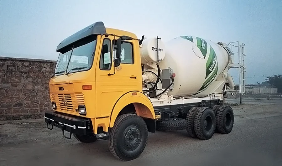 Yellow cab Tata LPK 2516 concrete transit mixer truck with Stetter drum parked outdoors